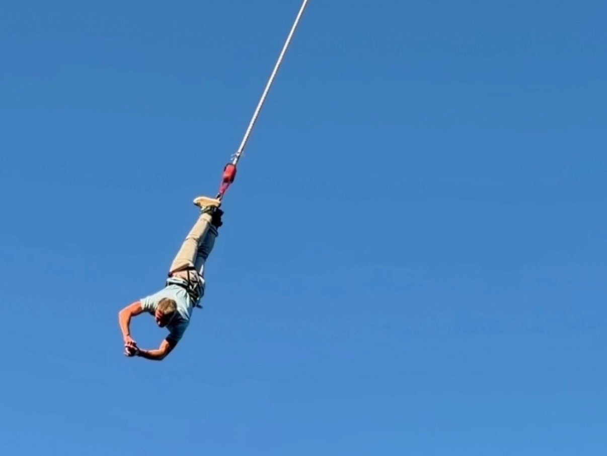 Man bungee jumping