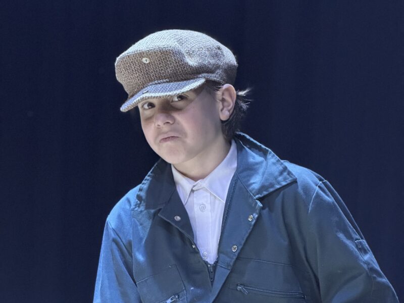 School pupil on stage